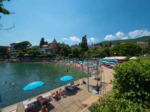 Water, Sky, Cloud, Plant, Umbrella, Azure, Tree, Swimming Pool, Coastal And Oceanic Landforms, Leisure