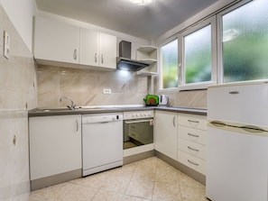 Cabinetry, Kitchen Sink, Sink, Countertop, Window, Kitchen Stove, Building, Kitchen, Kitchen Appliance, Home Appliance