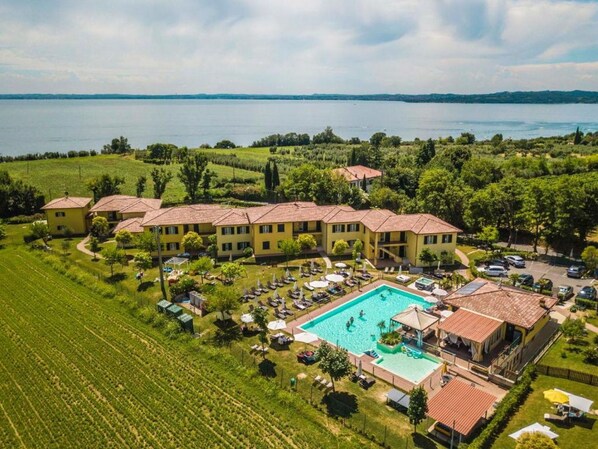 Cloud, Sky, Water, Plant, Property, Nature, Azure, Swimming Pool, Tree, Land Lot