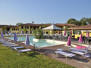 Sky, Water, Swimming Pool, Shade, Outdoor Furniture, Sunlounger, Building, Tree, Leisure, Recreation