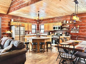 Open concept Sitting/Dining/Kitchen area with vaulted ceilings