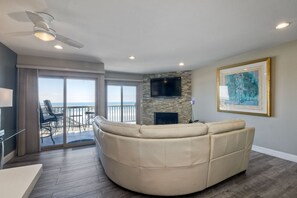 Sliding glass patio door opens up to a private oceanfront porch