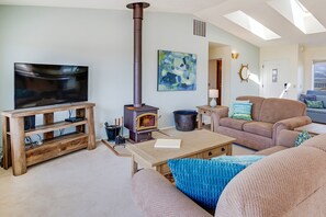 Multiple seating areas: one to watch television and one to watch the ocean!