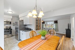 Dining seats four and is right in the heart of the home!
