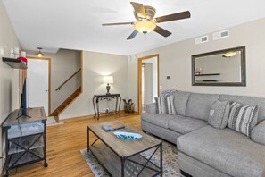 Main living area with stairs to second level