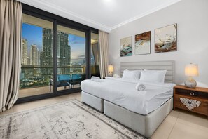 Bedroom with Skyline Views: Wake up to stunning Dubai skyline views from your chic retreat!