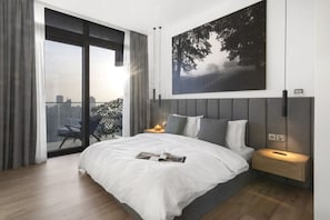 Master Bedroom: Wake up to stunning skyline views and modern elegance in this stylish retreat!
