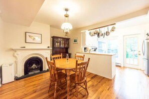 Dining Area: Gather around the dining table for meals and memories.