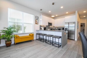 Picture yourself stepping into a contemporary kitchen—a harmonious blend of style and functionalit. Imagine gathering around th This space isn’t just a vacation rental; it’s a home away from home, promising comfort, sophistication, and memorable moments. Bon appétit!