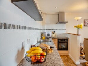 Kitchen area | Bwthyn Hudol Bach - Llwynhudol Vineyard Cottages, Pwllheli