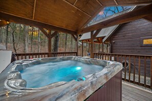 Find your bliss in the hot tub for 4-6 in its own covered pavilion.
