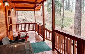 Relax on the viewing deck of this cozy cabin in Ruidoso. Enjoy serene forest views, fresh mountain air, and peaceful surroundings. The perfect spot for morning coffee or evening relaxation.