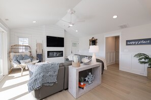 Stylish Open-Concept Living Room with Natural Light