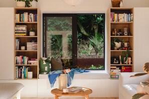 Enjoy views of the garden from the bay window that slides open.