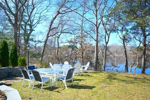 Outdoor seating for 6 at the table, plus 4 at the fire pit