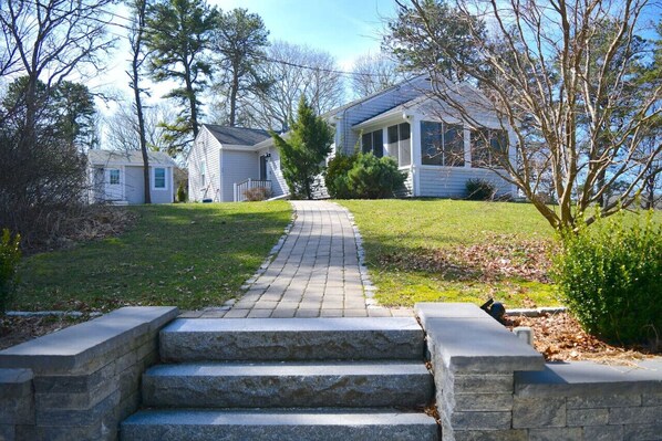 Entrance to home that is very private.  You pass the two front yards with plenty of space to entertain and play