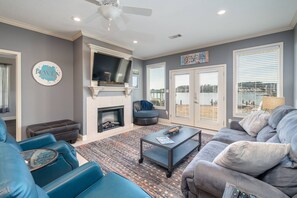 Living Room With Large Comfortable Seating | Smart TV with Streaming Capabilities