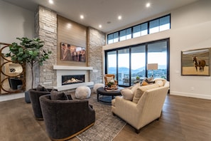 Incredible sliding glass doors extend the Living Room onto the outside deck.