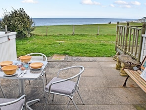 Sitting-out-area | Bacton Seaview Bungalow, Bacton