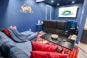 Your own private movie theater room, complete with fireplace!