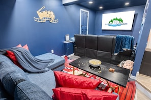 Your own private movie theater room, complete with fireplace!