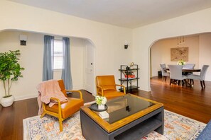 Comfy living room with child proof fireplace.  See more reviews on airb listing