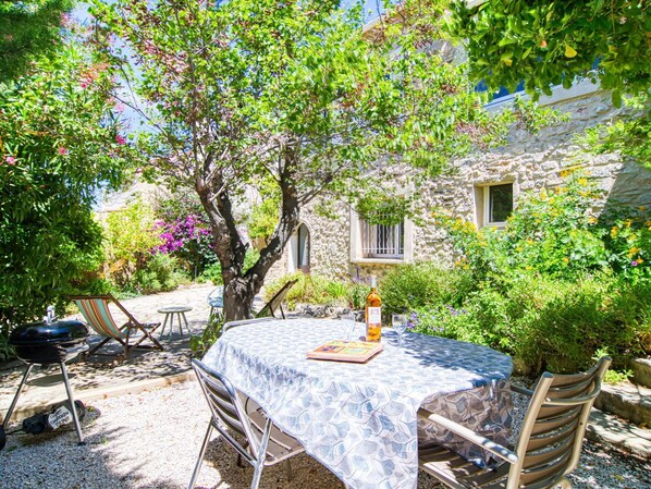 Plant, Table, Furniture, Property, Window, Chair, Building, Flower, Tree, Outdoor Table