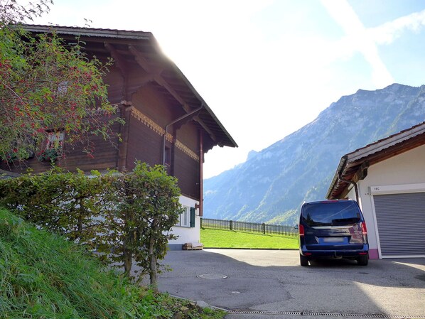Sky, Plant, Property, Building, Cloud, Vehicle, Motor Vehicle, Car, Wheel