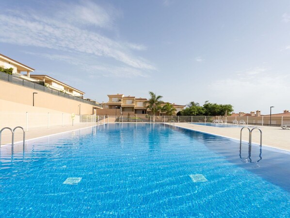 Sky, Water, Property, Chair, Shade, Wood, Interior Design, Body Of Water, Floor, Outdoor Furniture