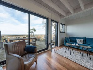 Sky, Water, Property, Chair, Shade, Wood, Interior Design, Body Of Water, Floor, Outdoor Furniture