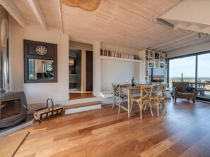 Sky, Water, Property, Chair, Shade, Wood, Interior Design, Body Of Water, Floor, Outdoor Furniture