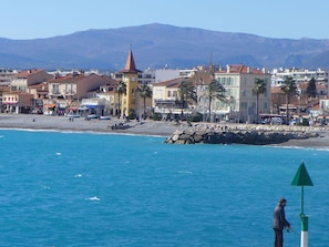 Water, Sky, Building, Blue, Azure, Mountain, Coastal And Oceanic Landforms, Body Of Water, Tower