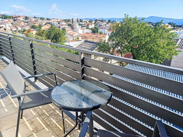 Sky, Property, Azure, Outdoor Furniture, Building, Urban Design, Tree, Shade, Table, Landscape
