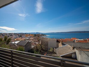 Sky, Water, Property, Chair, Shade, Wood, Interior Design, Body Of Water, Floor, Outdoor Furniture