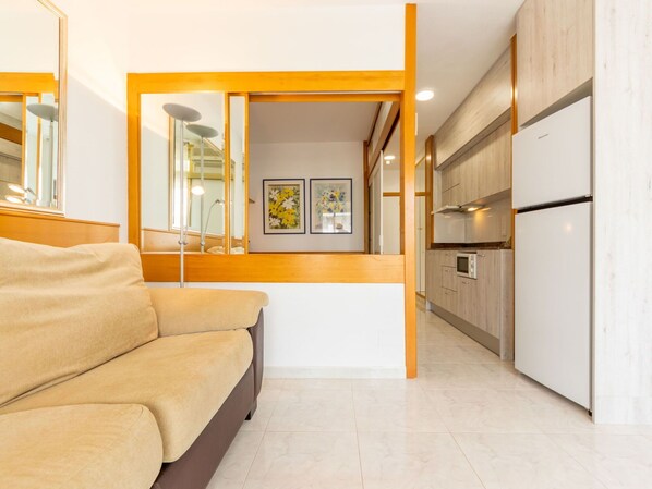 Couch, Orange, Wood, Comfort, Flooring, Floor, Building, Door, Real Estate