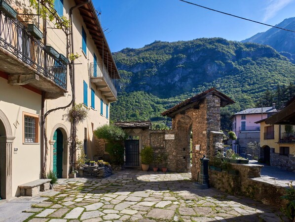 Sky, Plant, Building, Property, Mountain, Window, Azure, Infrastructure, House, Road Surface