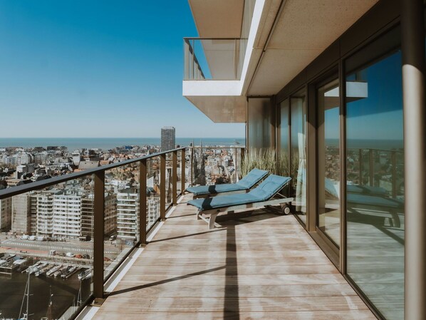 Sky, Daytime, Property, Building, Azure, Shade, Wood, Lighting, Condominium, Floor