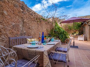 Cloud, Table, Sky, Furniture, Plant, Chair, Azure, Building, Outdoor Table, Flowerpot