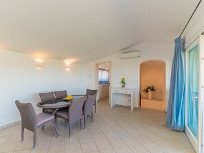 Furniture, Building, Table, Chair, Houseplant, Curtain, House, Flooring, Floor, Living Room