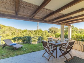 Plant, Property, Furniture, Table, Shade, Building, Wood, Tree, Outdoor Furniture, Interior Design