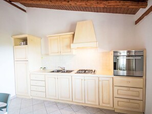 Kitchen, Interior Design, Wood, Flooring, Countertop, Furniture, Kitchen Appliance, Cabinetry, Major Appliance, Floor