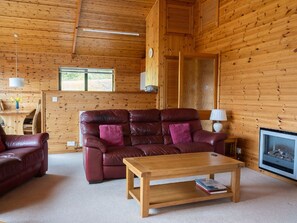 Furniture, Couch, Comfort, Wood, Table, Purple, Flooring, Interior Design, Floor, Living Room
