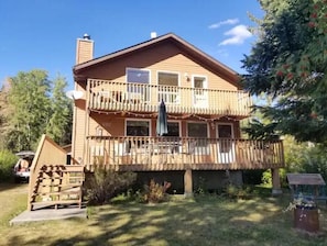 Cottage front, showing 2nd floor private balcony off master bedroom.