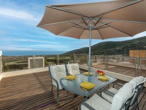 Table, Sky, Furniture, Property, Umbrella, Chair, Building, Azure, Shade, Cloud