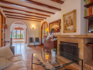 Property, Picture Frame, Furniture, Couch, Wood, Interior Design, Flooring, Floor, Living Room, Chair