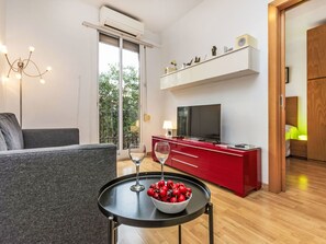 Furniture, Property, Cabinetry, Plant, Comfort, Interior Design, Wood, Flooring, Living Room, Table