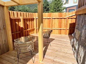 Wood, Outdoor Furniture, Building, Chair, Tree, Wood Stain, Hardwood, Flooring, Real Estate, Grass