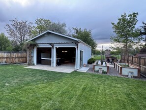 Private backyard, garden patio and garage hangout