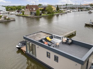 Water, Cloud, Building, Sky, Boat, Body Of Water, Lake, Tree, Vehicle, Bank