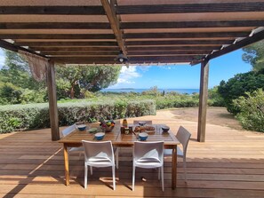 Plant, Property, Sky, Shade, Table, Wood, Tree, Outdoor Furniture, Cottage, Chair